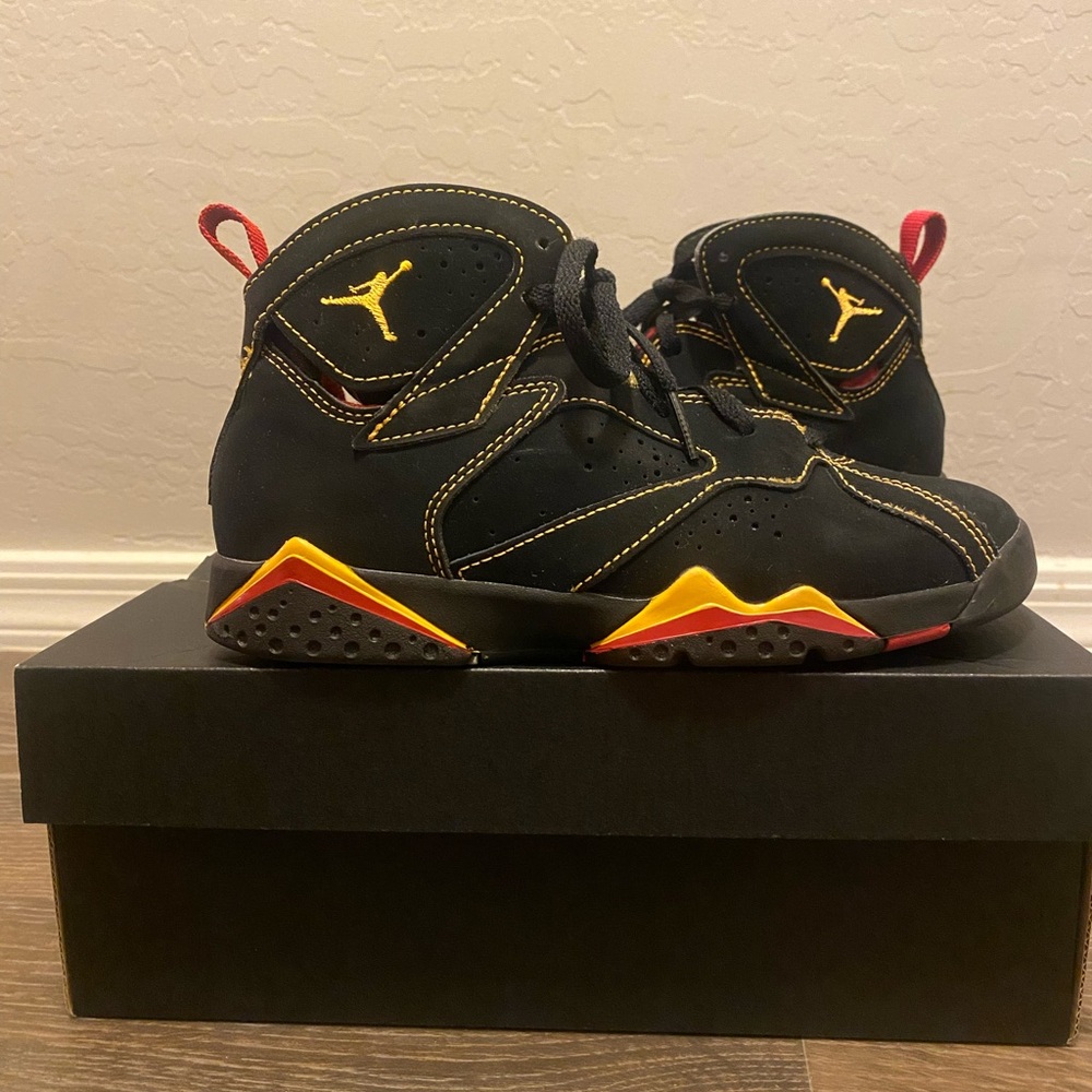 Jordan 7 Retro "Black/Citrus/Varsity Red" Grade School Kids' Shoe